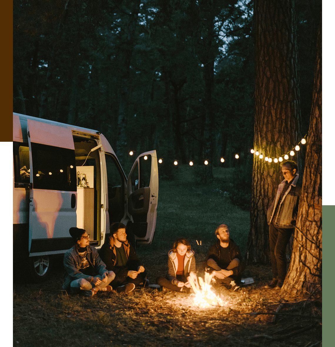 Outdoor night gathering by a van